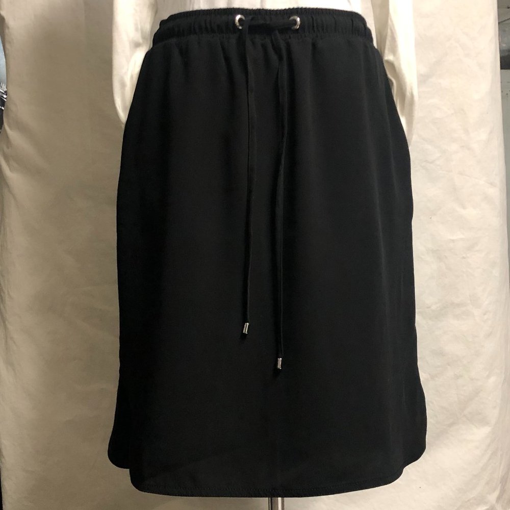 Ann Taylor, black skirt with pockets, size medium